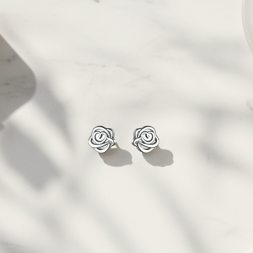 Silver rose knot stud earrings lifestyle
